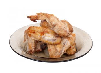 Royalty Free Photo of Fried Chicken Wings on a Plate
