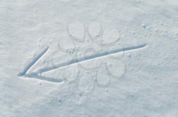 Arrow drawn on a snow