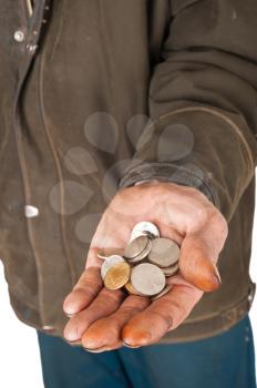 Hand of a beggar with coins