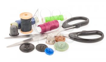 Spool of thread with buttons and scissors