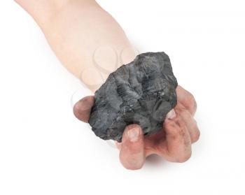 A piece of coal in hand