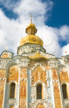 Kiev-Pecherskaya Laura. Orthodox church and blue sky with clouds
