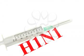 Swine FLU H1N1 disease alert - syringe with needle over white