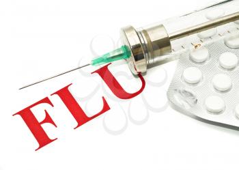 Swine FLU H1N1 - alert, old-fashioned syringe and pills over white