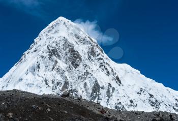 Snowed Pumori summit in Himalaya. Travel to Nepal