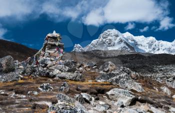 Tombstones or chorten for climber who died in Himalayas. Alpinism in Nepal