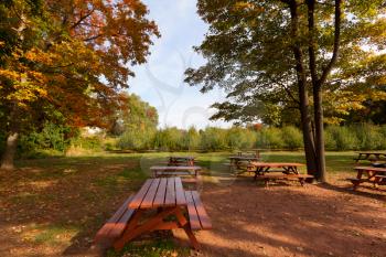 Royalty Free Photo of a Country Park Are With Tables