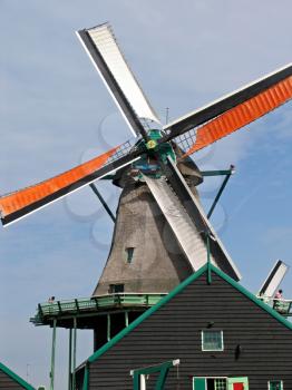 Windmill in rural area of Holland.