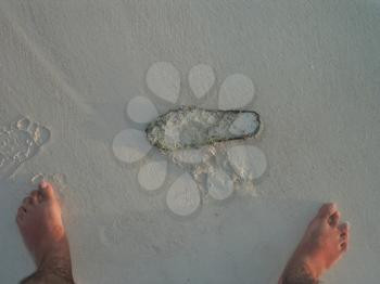 Shoe sole washed ashore on the caribbean beach.