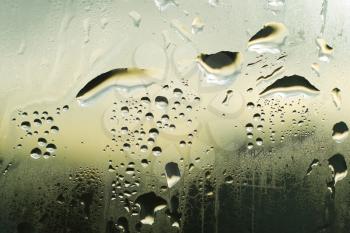 natural large and fine water drops on glass