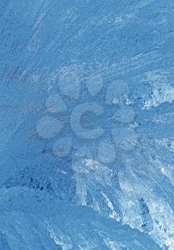 blue frosty natural pattern on winter glass