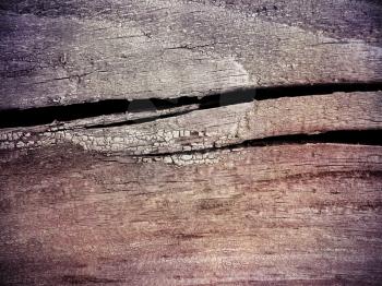 Closeup of very old wooden texture with large cracks