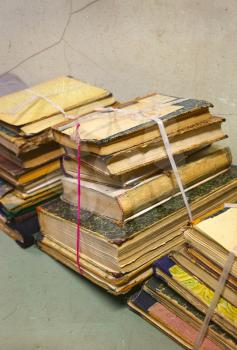 Stacks of very old books