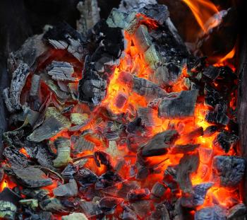 Closeup of live coals natural background