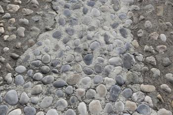 Background with rounded stones closeup