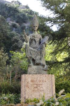 Statue abat Olibe (fundator of Montserrat) at the monastery the Benedictine Abbey Santa Maria de Montserrat, near Barcelona, Catalonia, Spain