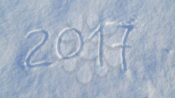 2017 (New Year) drawing on the white snow 