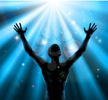A man with hands held up in silhouette with light rays in the background