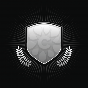 Royalty Free Clipart Image of a Shield With Leaves