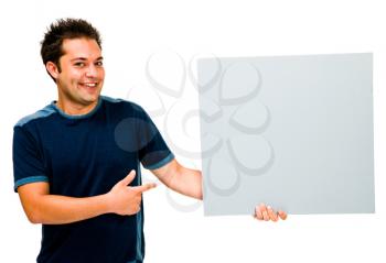 Royalty Free Photo of a Happy Man Holding a Blank Placard