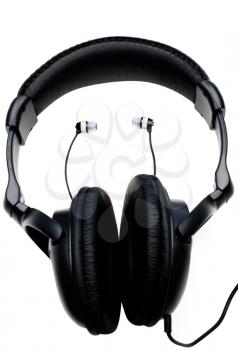 Royalty Free Photo of a Pair of Headphones and Earbuds