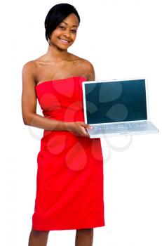 Royalty Free Photo of a Woman Showing a Laptop