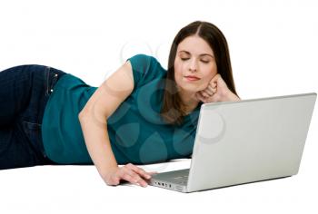 Royalty Free Photo of a Young Woman Using her Laptop