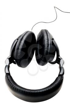 Black headphones isolated over white
