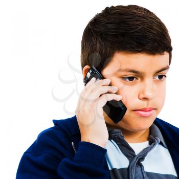 Boy on the phone isolated over white