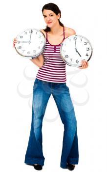 Portrait of a woman holding clocks and smiling isolated over white