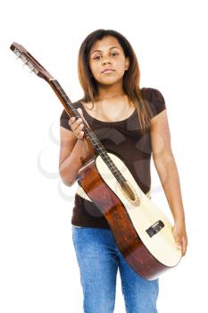 Portrait of a girl holding a guitar isolated over white