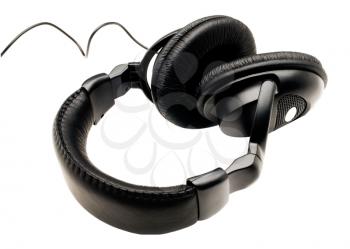 Single black headphones isolated over white
