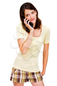 Young woman talking on a mobile phone isolated over white