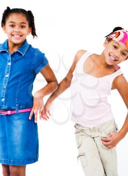 African American girls standing together and posing isolated over white