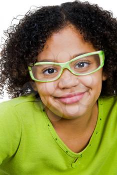 Portrait of a girl wearing eyeglasses and posing isolated over white