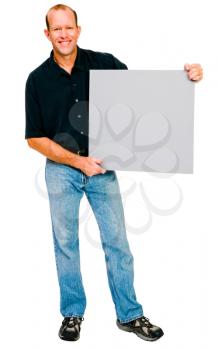 Happy man showing a placard isolated over white