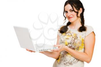 Caucasian young woman holding a laptop isolated over white