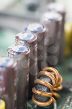 Close-up of capacitors in a circuit board