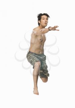 Young man jumping with joy