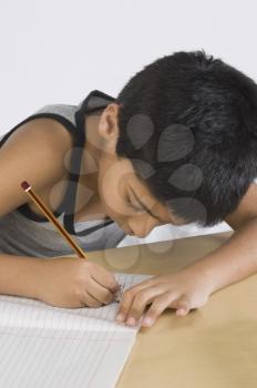Boy doing homework at desk