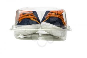 Close-up of a pair canvas shoes in a box