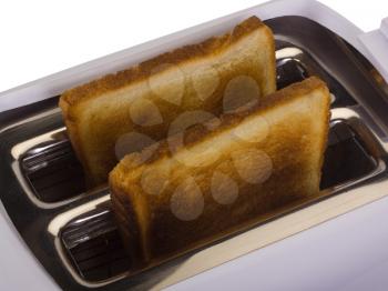 Close-up of a toaster with toasts