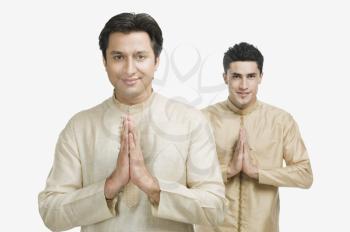 Two men in prayer position