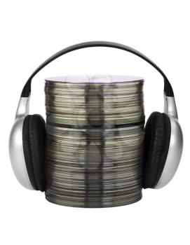 Stack of compact discs with headphones
