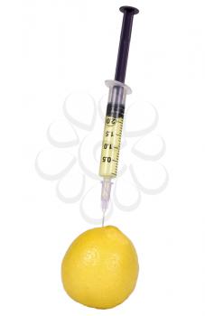 Lemon being injected with a syringe