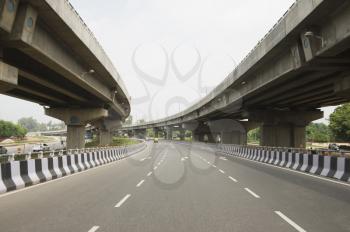 Road in the middle of overpasses, National Highway 8, New Delhi, India