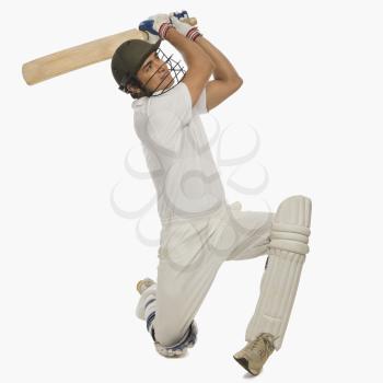 Cricket batsman playing a cover drive