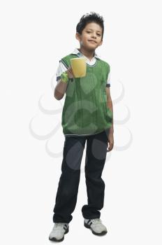 Portrait of a boy drinking hot chocolate