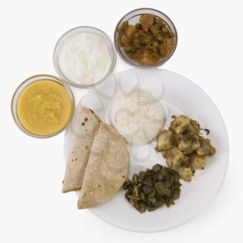 High angle view of assorted Indian food