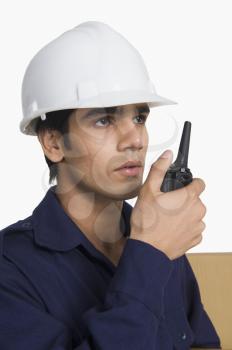 Store incharge on a walkie-talkie